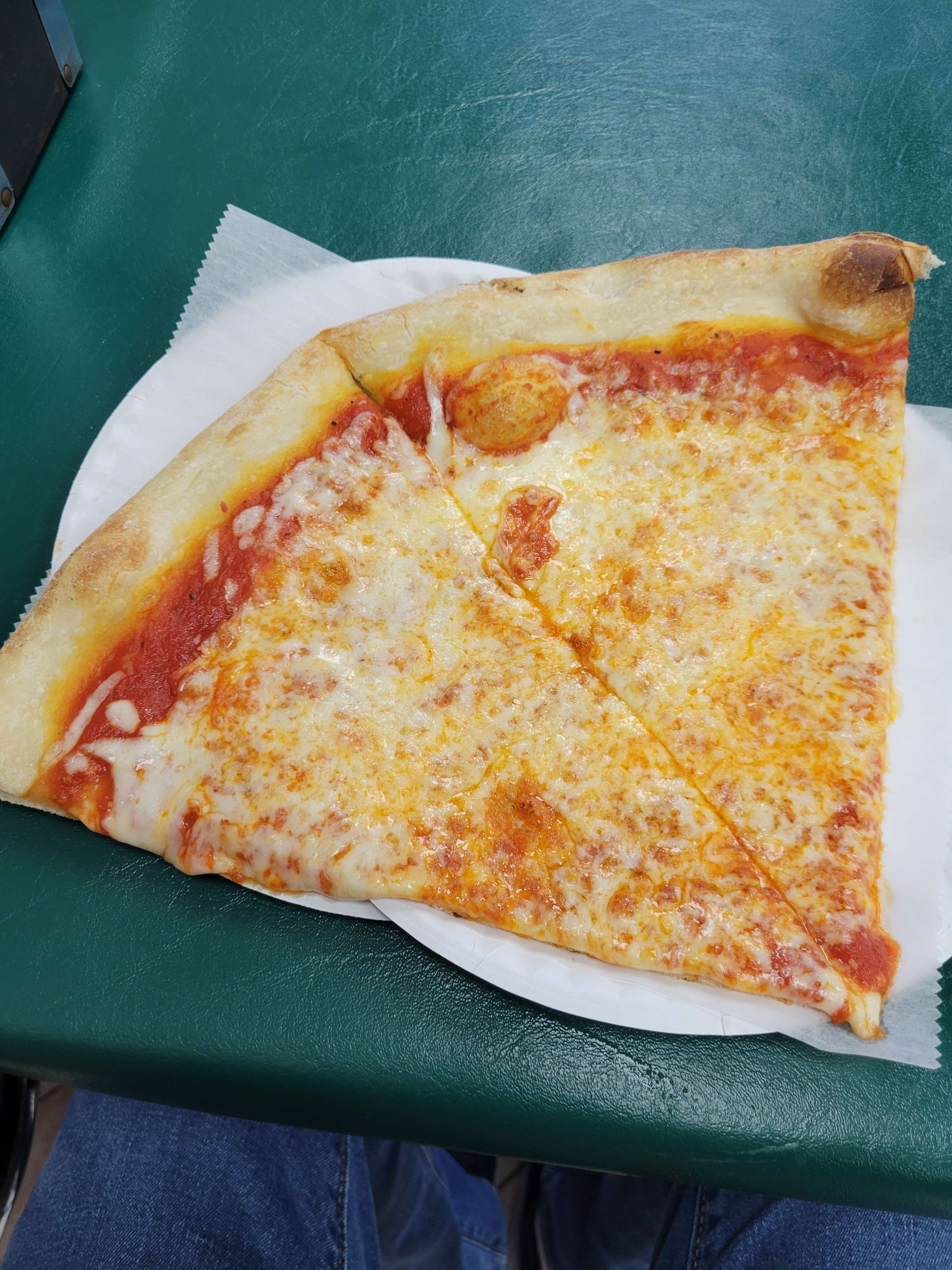 Pizza slice my friend, Aaron Pastor, sent me to indicate he had finally arrived back home in down-state New York.